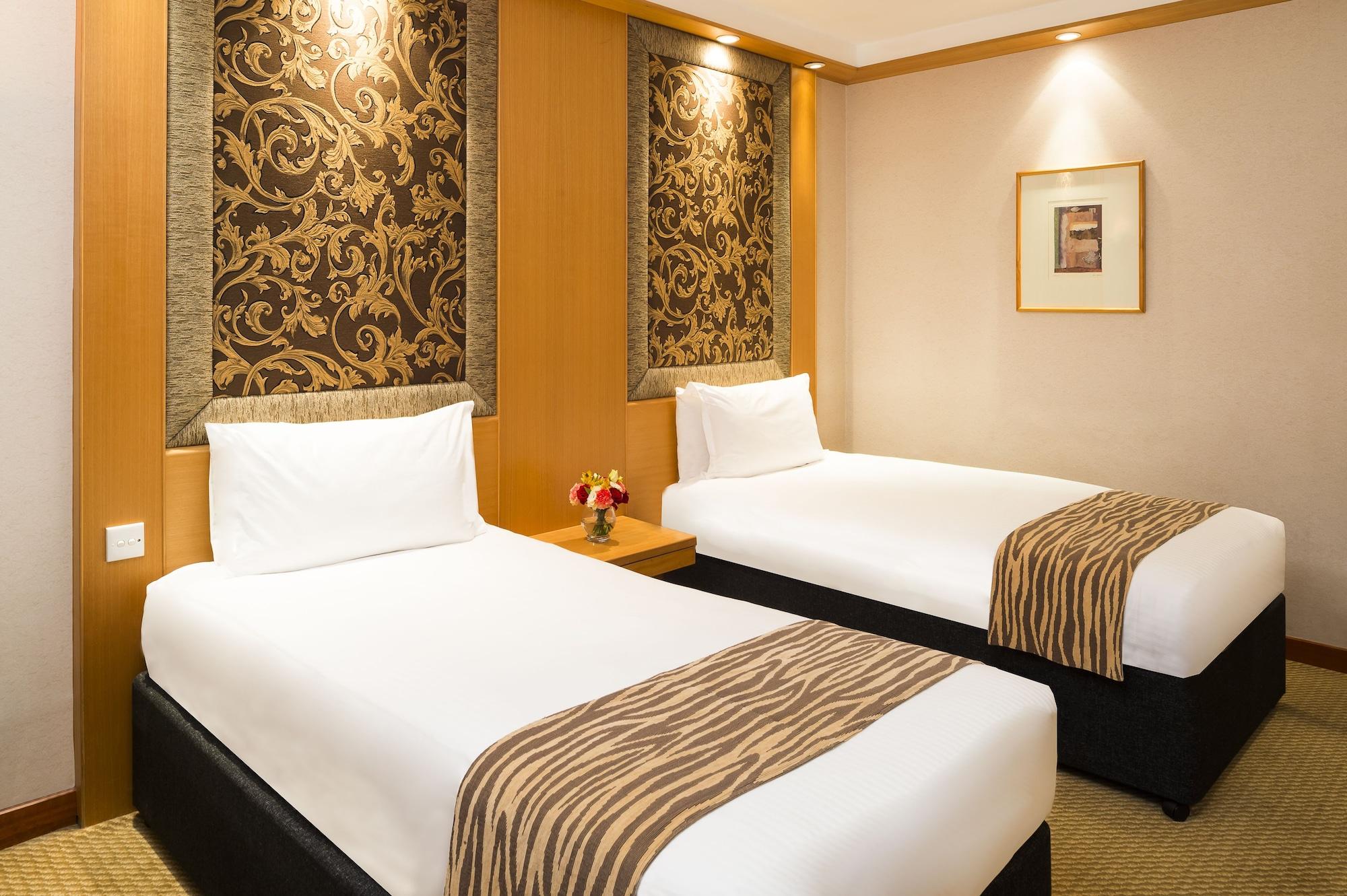 Millennium Hotel And Conference Centre Gloucester London Exterior photo Two single beds in a hotel room